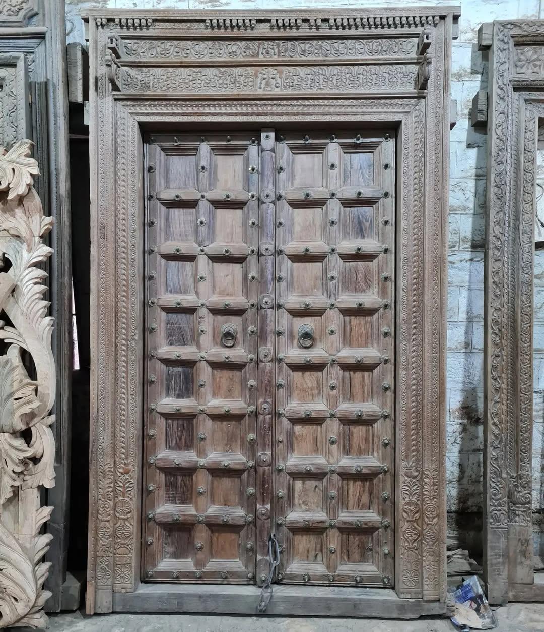 Vintage Wooden Door with Detailed Carvings
