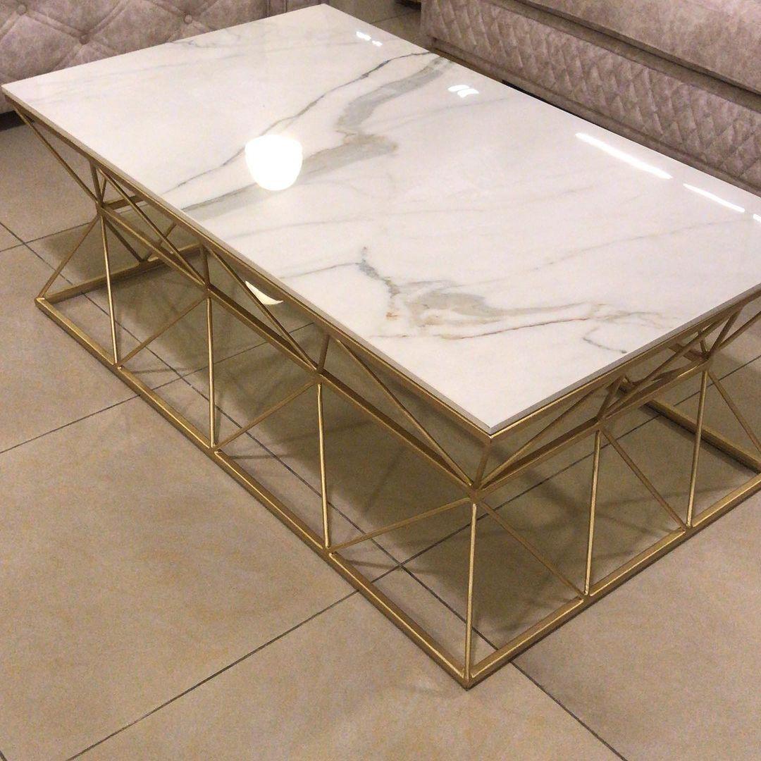 Elegant Marble Coffee Table with Gold Geometric Base