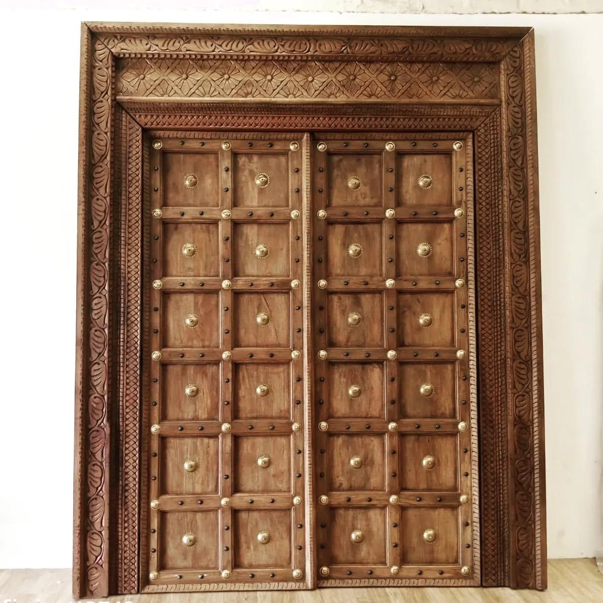 Rustic Wooden Door with Brass Accents