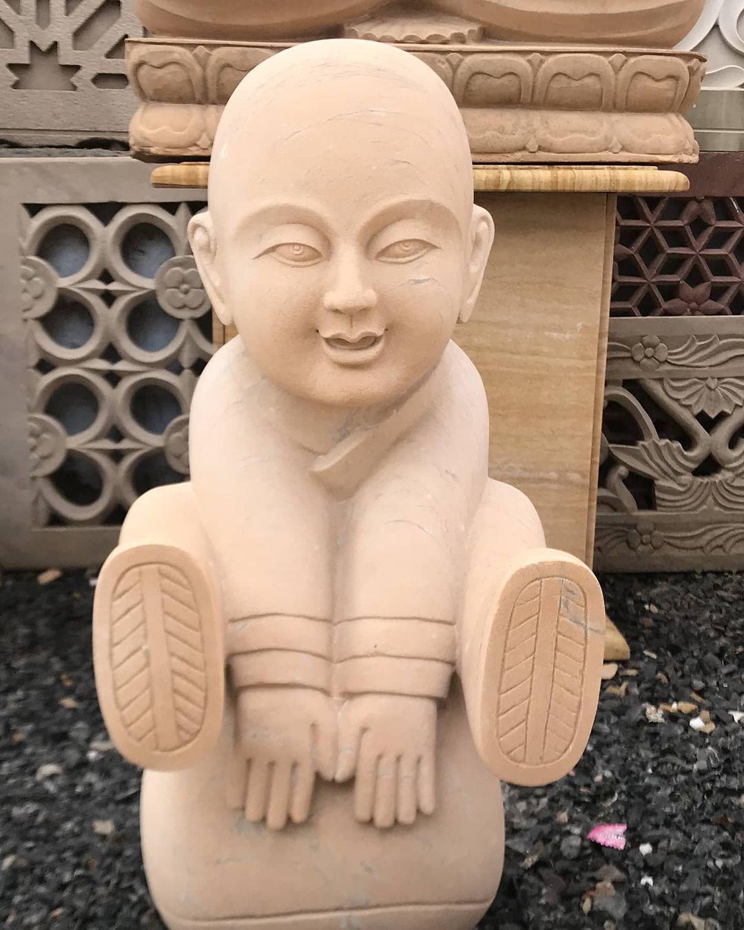 Sandstone Monk Sculpture